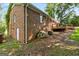 The exterior features a classic brick design, with a door leading to a basement at 1833 S Highway 92, Fayetteville, GA 30215