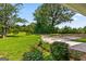 View from the front porch area overlooking the driveway and green yard at 1833 S Highway 92, Fayetteville, GA 30215