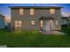 Backyard with a door and a small patio at 2655 Virginia Cv, Riverdale, GA 30296