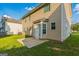 Backyard with a door and a small patio at 2655 Virginia Cv, Riverdale, GA 30296