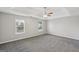 Large main bedroom with lots of light and neutral carpeting at 2655 Virginia Cv, Riverdale, GA 30296