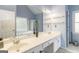 Bright bathroom features double sinks, a soaking tub with shower, and ample counter space at 539 Riverbirch Trce, Stone Mountain, GA 30087
