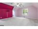 Bright bedroom featuring a ceiling fan, a window, and walls painted in two tones at 539 Riverbirch Trce, Stone Mountain, GA 30087