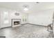 Spacious living room with fireplace, TV mount, and ample natural light from large windows at 539 Riverbirch Trce, Stone Mountain, GA 30087