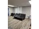 Finished basement area with vinyl floors, recessed lighting, and room to relax at 2911 Chesterfield Se Way, Conyers, GA 30013