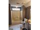 Full bathroom with a shower-tub combo and white tile flooring at 2911 Chesterfield Se Way, Conyers, GA 30013