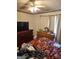 Bedroom with ceiling fan and drapes at 2911 Chesterfield Se Way, Conyers, GA 30013