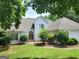 Charming one-story home with mature landscaping and inviting entrance, showing great curb appeal at 2911 Chesterfield Se Way, Conyers, GA 30013