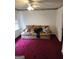 Living room featuring carpet and sofa at 2911 Chesterfield Se Way, Conyers, GA 30013