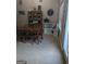 Dining room featuring a wooden table, hutch, and a decorative play kitchen at 1524 Queen Elizabeth Dr, Locust Grove, GA 30248
