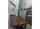 The dining room features a fireplace, a hutch, and a long wooden table at 1524 Queen Elizabeth Dr, Locust Grove, GA 30248
