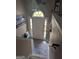 Welcoming entryway with a decorative rug and arched window above the front door at 1524 Queen Elizabeth Dr, Locust Grove, GA 30248