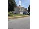 Charming two-story home with a well-maintained lawn and an attached two-car garage at 1524 Queen Elizabeth Dr, Locust Grove, GA 30248
