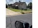 Back exterior view of house with lawn and deck at 1524 Queen Elizabeth Dr, Locust Grove, GA 30248