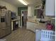 Well-equipped kitchen featuring stainless steel appliances and modern cabinets at 1524 Queen Elizabeth Dr, Locust Grove, GA 30248