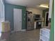 Spacious kitchen area with stainless steel appliances and ample countertop space at 1524 Queen Elizabeth Dr, Locust Grove, GA 30248