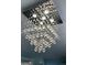 Elegant chandelier with cascading crystals, adding a touch of sophistication to the ceiling at 8436 Magnolia Dr, Jonesboro, GA 30238