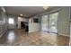 An open kitchen features stainless steel appliances and a door leading to the outside at 8436 Magnolia Dr, Jonesboro, GA 30238