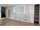 Open room featuring neutral walls, decorative molding, and tile flooring at 8436 Magnolia Dr, Jonesboro, GA 30238