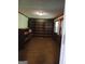 Office with built-in wooden bookshelves and natural light, perfect for a home office or study at 177 Northwind Sw Ct, Lilburn, GA 30047