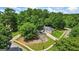 Aerial view of the charming single-Gathering home with mature trees and manicured landscaping at 539 Horseshoe Cir, Stockbridge, GA 30281