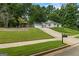 Home features an attached garage, manicured lawn and landscaping, and traditional architecture at 539 Horseshoe Cir, Stockbridge, GA 30281