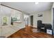 Open concept living space and kitchen area with hard wood floors and neutral paint at 539 Horseshoe Cir, Stockbridge, GA 30281