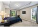 Spacious bedroom offers natural light, tray ceiling, and carpeted floors at 539 Horseshoe Cir, Stockbridge, GA 30281