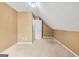 Attic room with sloped ceilings and door at 10044 Point View Dr, Jonesboro, GA 30238