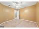 Bedroom with door and ceiling fan at 10044 Point View Dr, Jonesboro, GA 30238