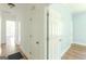Hallway view with doorways leading to other rooms, showcasing the home's layout at 1493 Vesta Ave, Atlanta, GA 30337