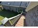 View of the home's lush, green backyard from the second story deck at 195 Twin Oaks Dr, Hampton, GA 30228