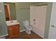 Traditional bathroom featuring oak cabinets and a shower and tub combination at 195 Twin Oaks Dr, Hampton, GA 30228