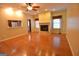 Spacious living room with fireplace, hardwood floors, and natural light at 195 Twin Oaks Dr, Hampton, GA 30228
