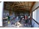 Large outbuilding with lawnmower, golf carts, and miscellaneous equipment at 195 Twin Oaks Dr, Hampton, GA 30228
