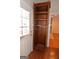 Wood cabinet with adjustable shelving near the back door at 195 Twin Oaks Dr, Hampton, GA 30228
