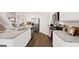 New kitchen features granite countertops, stainless steel appliances, and luxury vinyl plank flooring at 363 Friendship Oak Way, Hampton, GA 30228