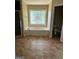 Bathroom view featuring a large tub, tiled flooring, and window at 4887 Winterview Ln, Douglasville, GA 30135