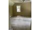 Bedroom featuring a ceiling fan and window with natural light at 4887 Winterview Ln, Douglasville, GA 30135