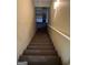 Carpeted stairs leading to the basement at 4887 Winterview Ln, Douglasville, GA 30135