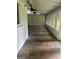 Bright sunroom with tile floors and multiple windows at 4887 Winterview Ln, Douglasville, GA 30135