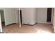 Unfinished basement with neutral walls, trim, and multiple doorways presents an opportunity for customized renovation at 2138 Rachael Se St, Atlanta, GA 30315