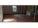 Unfinished basement with natural light, support beams, and a utility sink ready for customization and renovation at 2138 Rachael Se St, Atlanta, GA 30315