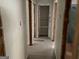 Hallway with bare walls and open doorframes leading to other rooms at 2138 Rachael Se St, Atlanta, GA 30315