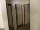 Hallway with bare walls and open doors leading to storage spaces at 2138 Rachael Se St, Atlanta, GA 30315