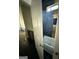 Bathroom featuring vanity, shower with glass door and marbled floors at 6409 Caledon Ct, Locust Grove, GA 30248