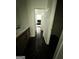 Bathroom featuring dark marble floors, a vanity, and entry to bedroom at 6409 Caledon Ct, Locust Grove, GA 30248