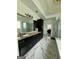 Elegant bathroom with marble flooring, modern fixtures, soaking tub and a glass shower at 6409 Caledon Ct, Locust Grove, GA 30248