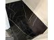 Unique bathroom floor with black marble and white veins at 6409 Caledon Ct, Locust Grove, GA 30248