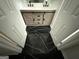 Bathroom with a barn door vanity and luxurious dark floors at 6409 Caledon Ct, Locust Grove, GA 30248
